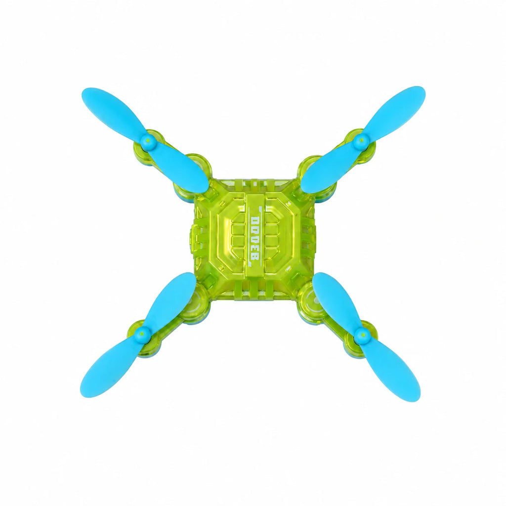 Green toy drone with blue propellers on a white background